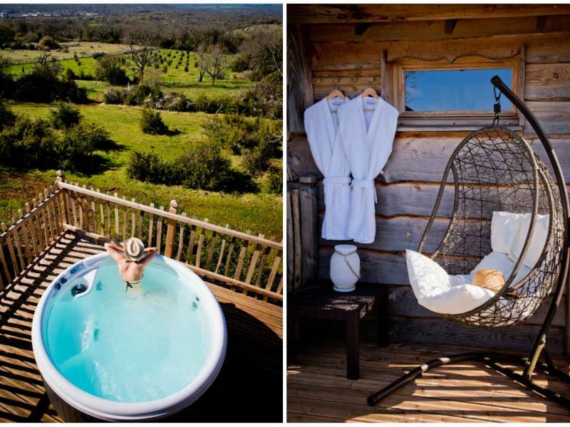 Cabane en bois avec jacuzzi extérieur et vue sur la nature environnante.