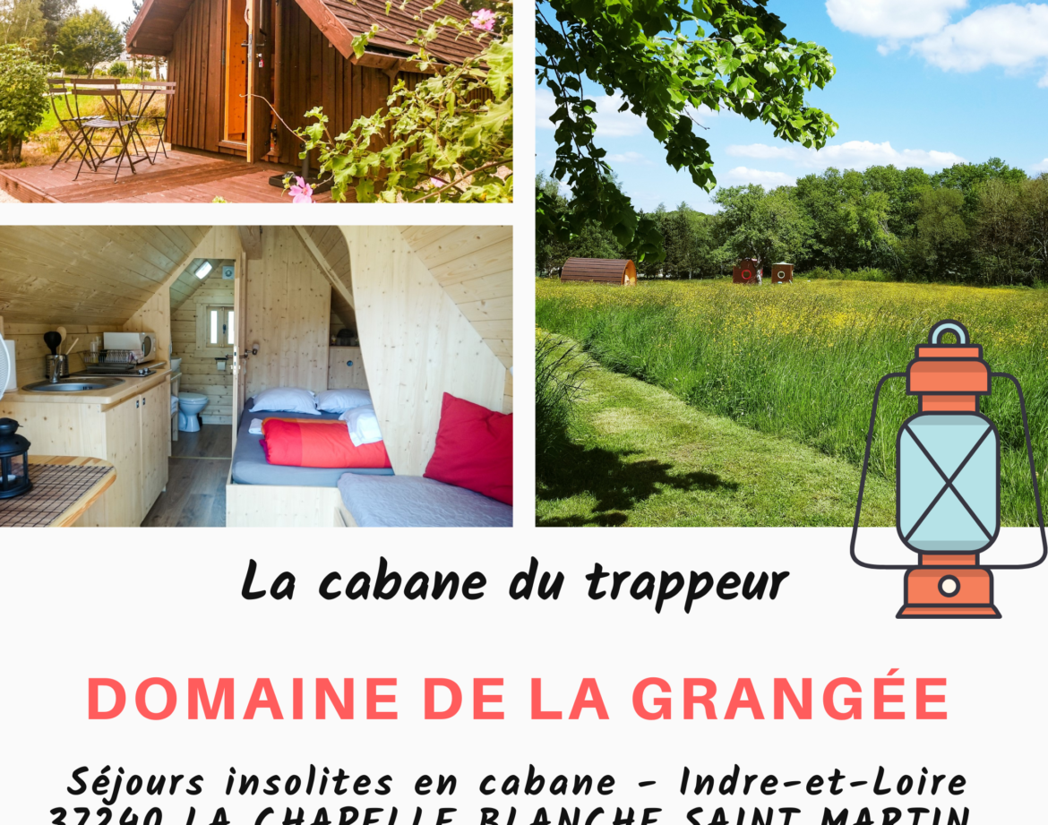 Cabane du trappeur au Domaine de la Grangée, entourée de verdure et de champs.