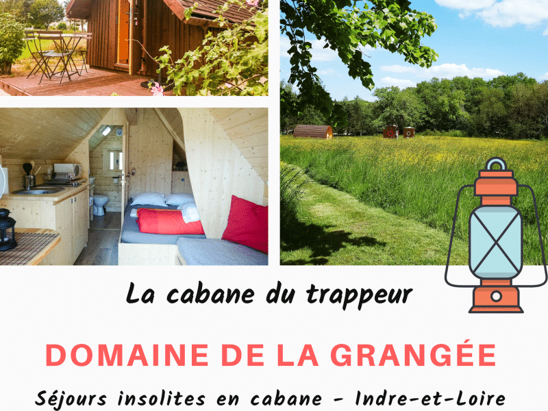 Cabane du trappeur au Domaine de la Grangée, entourée de verdure et de champs.