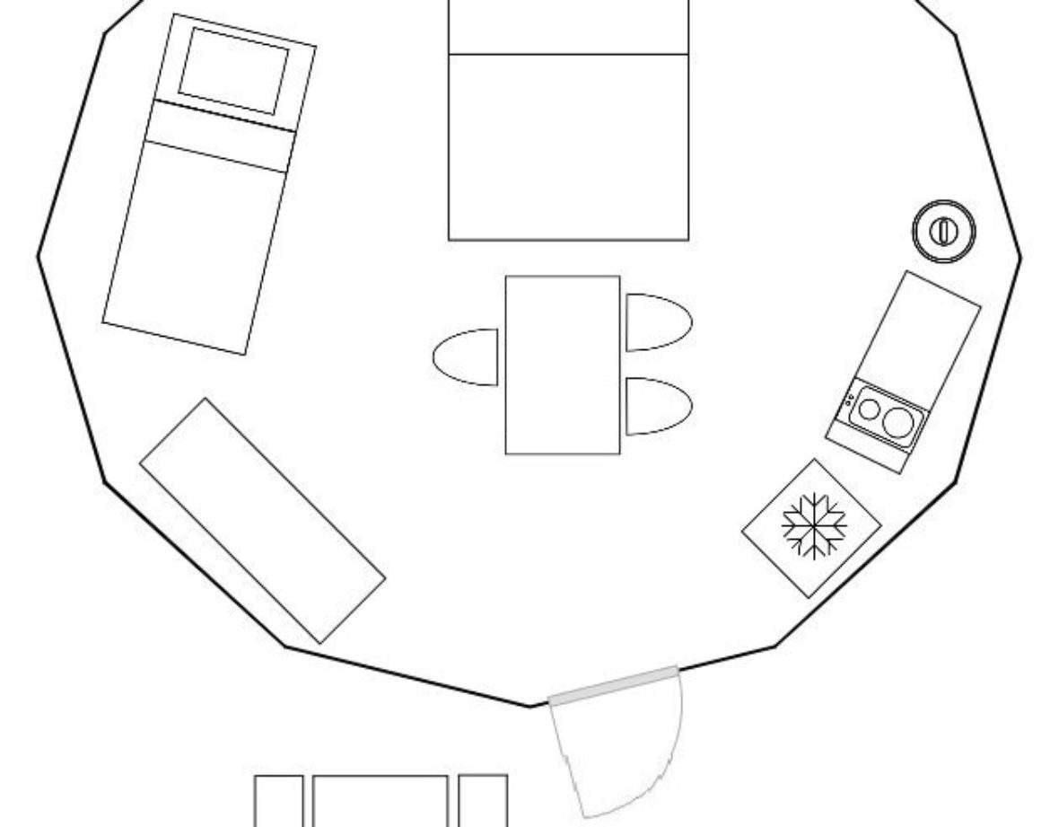 Hébergement insolite en Auvergne : un espace octogonal de 18 m² avec lit double et coin cuisine.