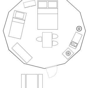Hébergement insolite en Auvergne : un espace octogonal de 18 m² avec lit double et coin cuisine.