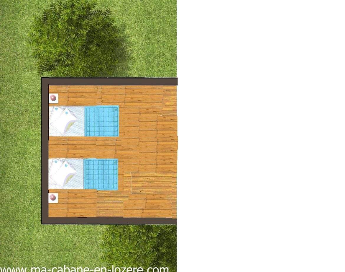 Cabane en bois avec terrasse, lits confortables et vue sur la nature verdoyante.