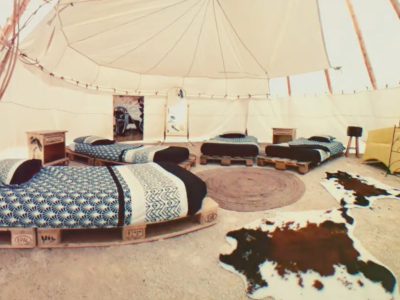 Tente tipi spacieuse avec lits confortables et décor chaleureux en Champagne-Ardenne.