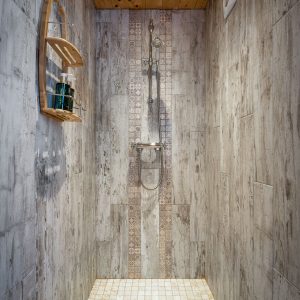 Douche moderne en bois dans un hébergement insolite en Aquitaine.