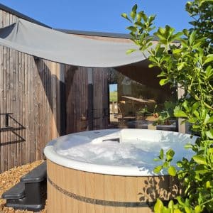 Cabane SPA Bois flotté jacuzzi paysage